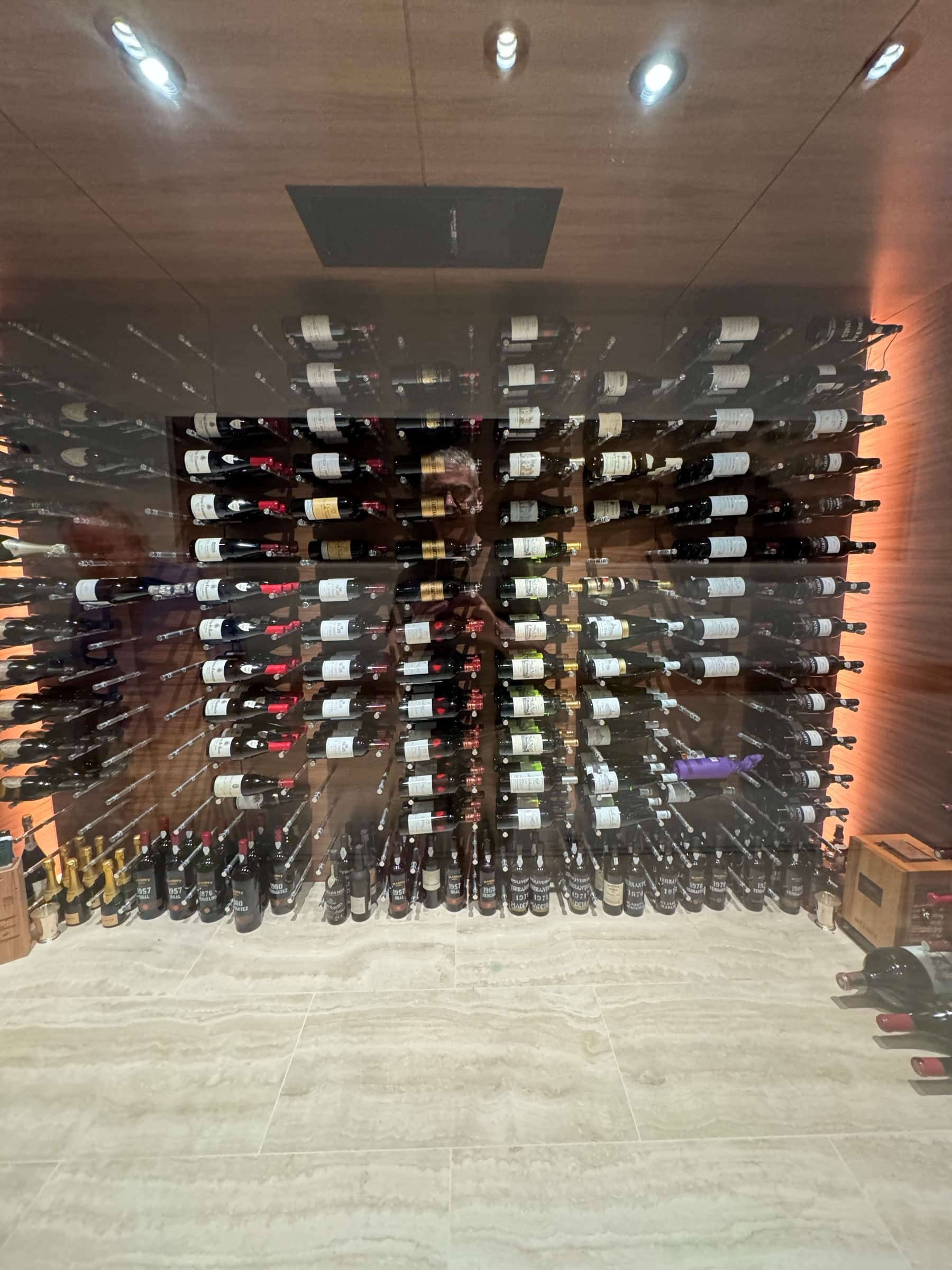 Deep cellar wall of bottles — more than a spreadsheet can hold