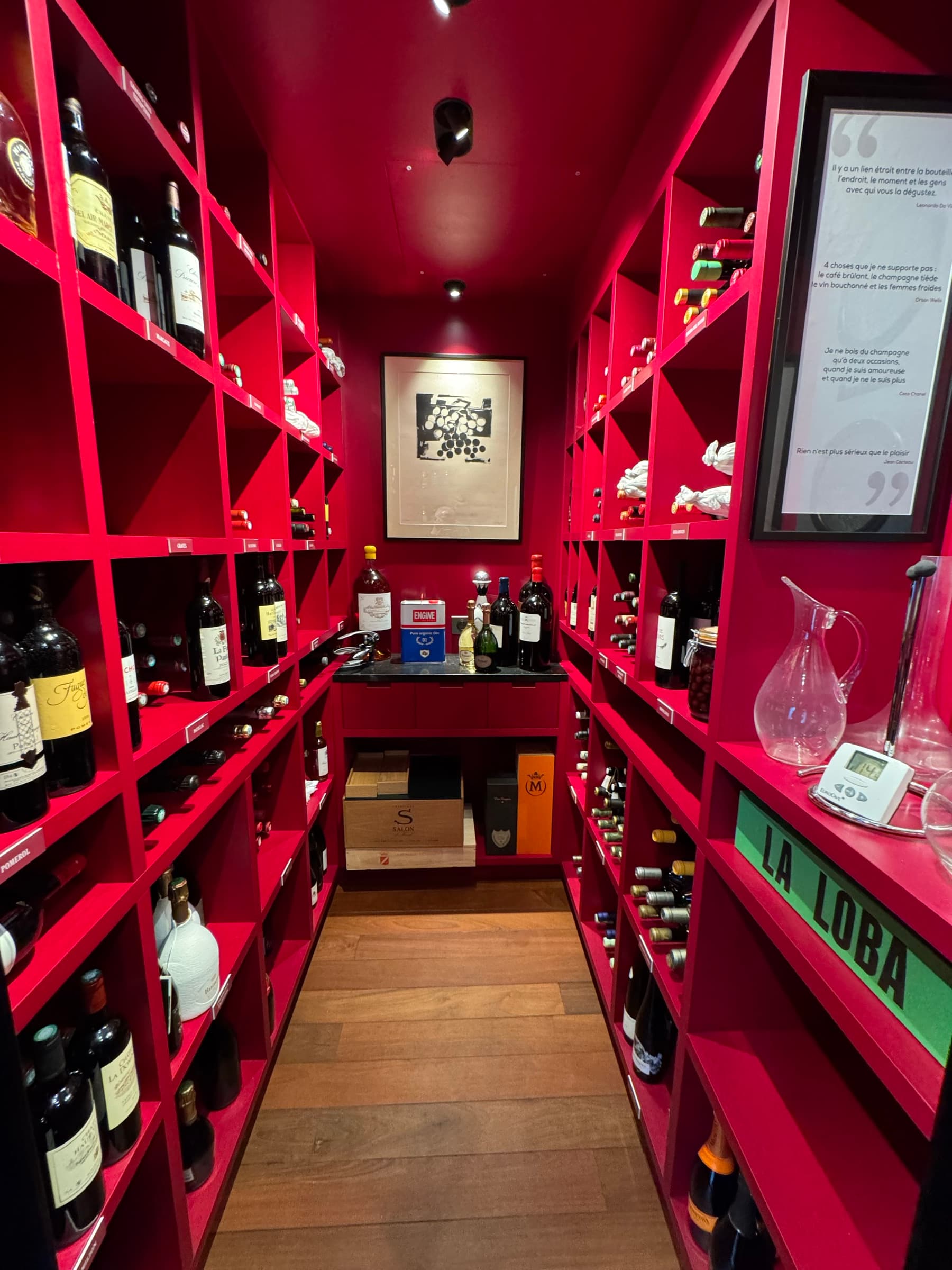 Private wine room with bottles in diamond bins